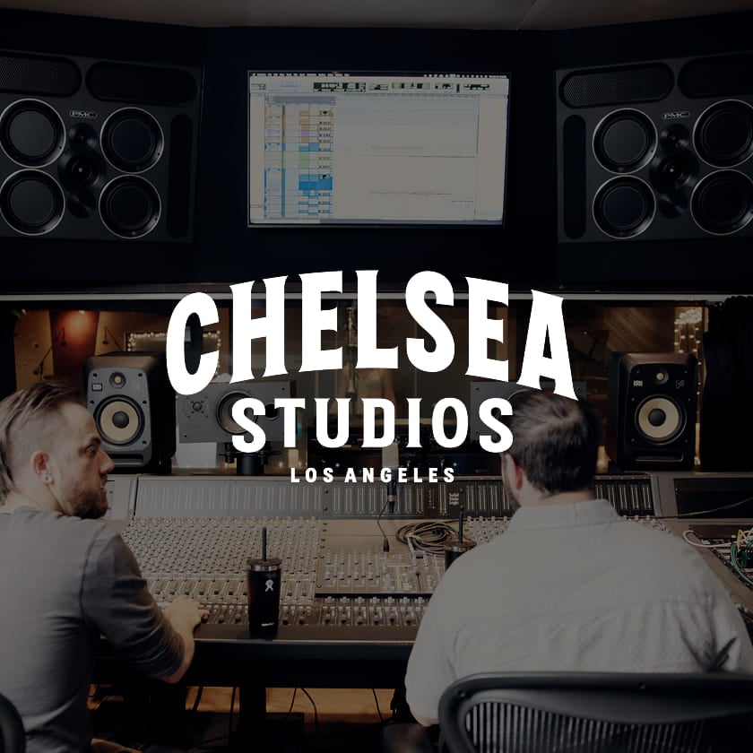 two men inside a recording studio mixing music with republic records studio logo overlayed